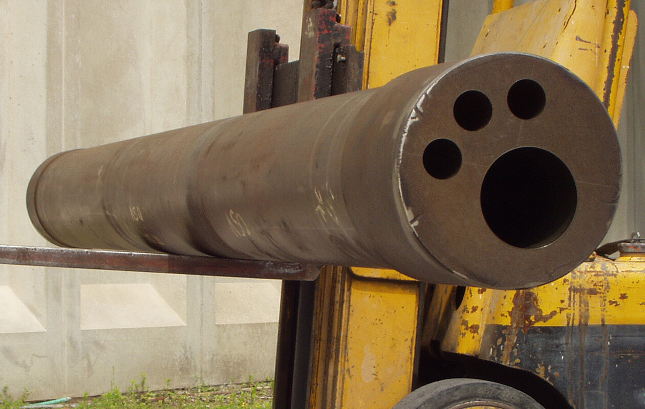 Drilled subsea riser